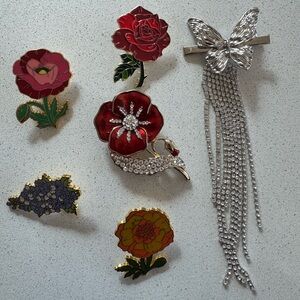 Floral pins and brooches.